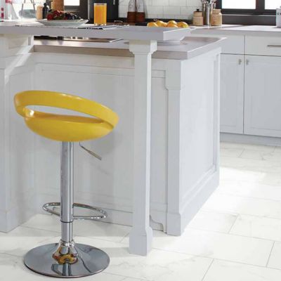 white tile floors in a modern bight kitchen